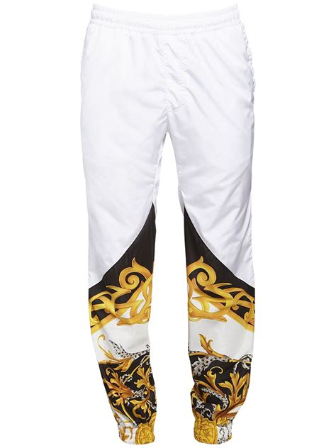 versace track pants white|Versace track pants.